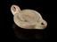 Roman terracotta oil lamp with impressed head of Isis