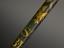 Long green painted wooden staff decorated with painted coat of