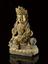 Hollow bronze statue representing Kuan Yin(?), seated on a lion