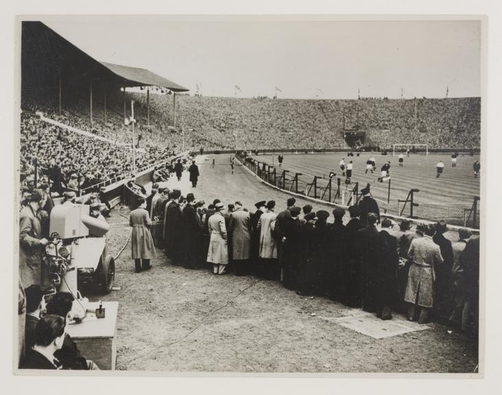 Photograph showing an Emitron camera at an England v Scotland