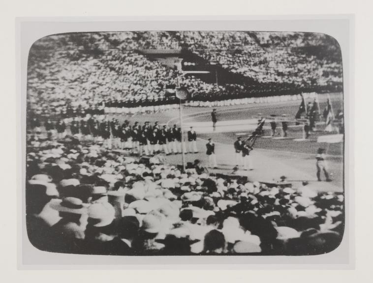 Photograph of a television screen showing the opening ceremony