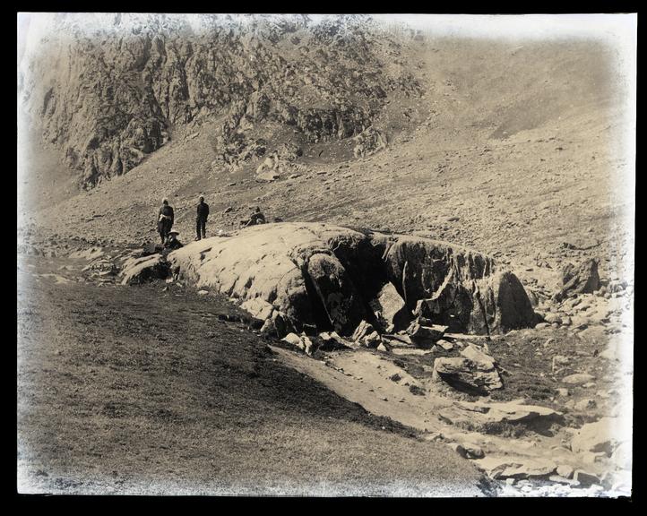 A mountainous scene with people in Kashmir