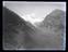 Glass plate negatives of mountainous views, one featuring tents