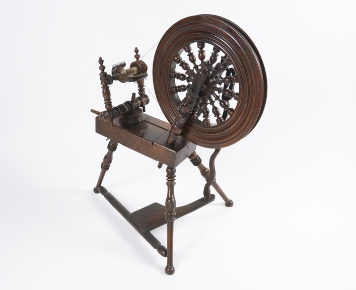 Small wooden spinning wheel, United Kingdom, 1801-1850.