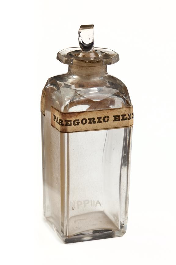 Glass bottle with glass stopper for paregoric elixir, empty