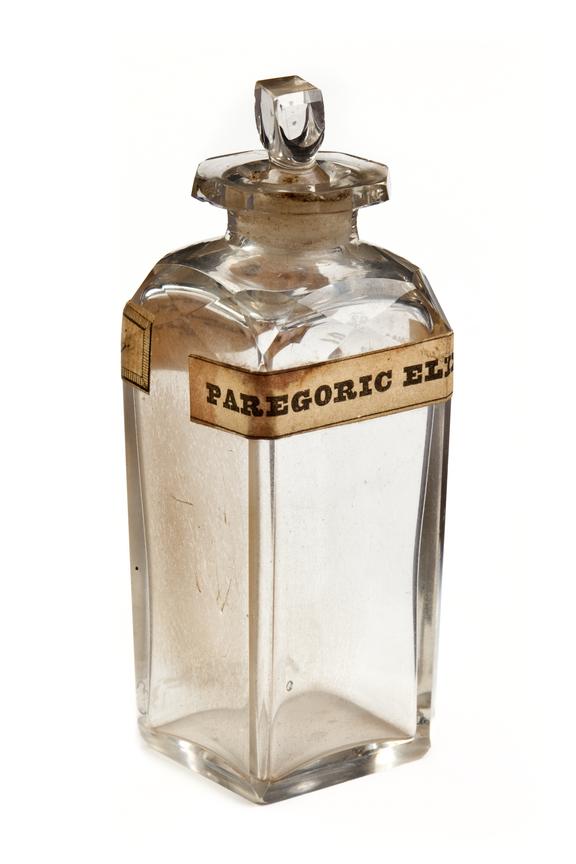 Glass bottle with glass stopper for paregoric elixir, empty