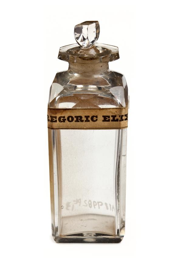 Glass bottle with glass stopper for paregoric elixir, empty