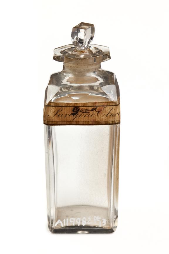 Glass bottle with glass stopper for paregoric elixir, empty