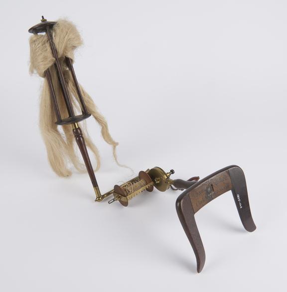 Portable spinning wheel, labelled 'James Webster, clockmaker