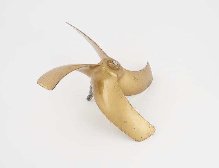 Brass model, scale 1:12, of a four bladed screw propeller (c