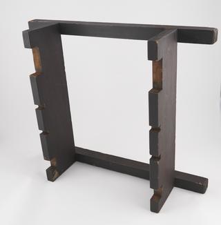 Purpose built wooden stand for four trussed beam models