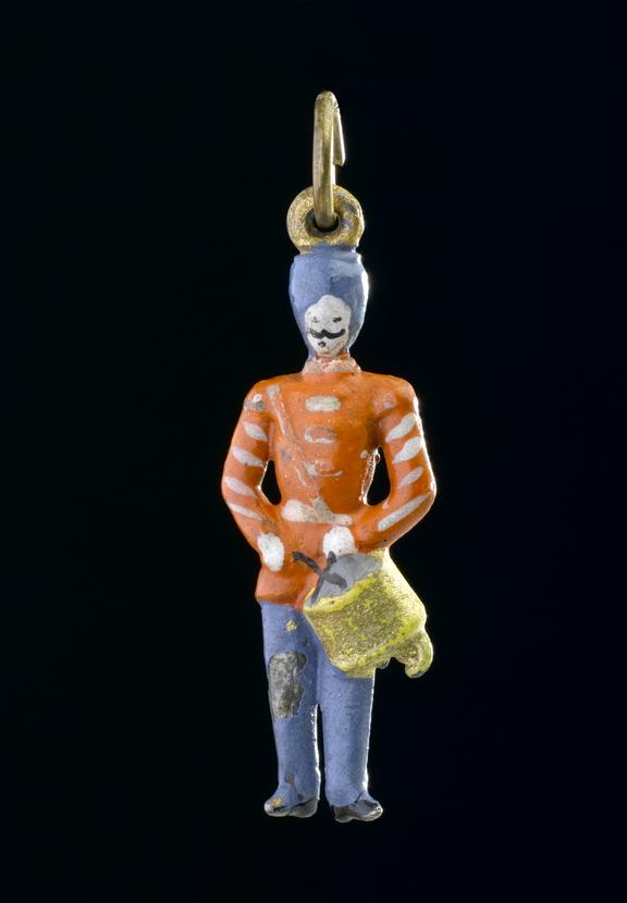 Metal amulet in the form of a soldier