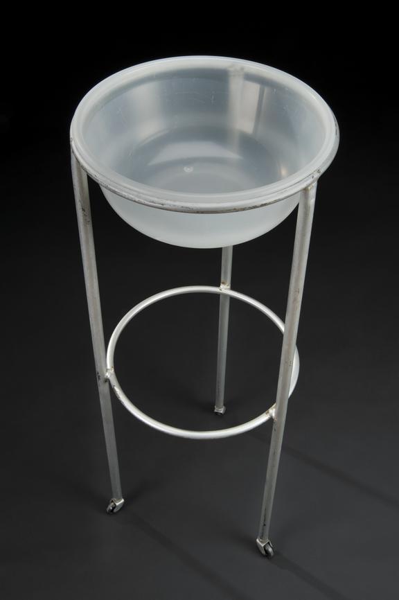 Hospital dressing trolley consisting of plastic swab bowl on