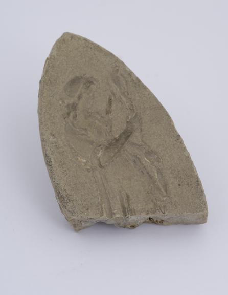 Plaster mould, woman spinning with distaff