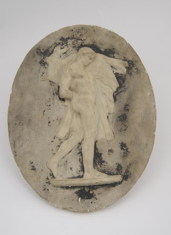 1 Plaster cast, nude woman with cloak as background