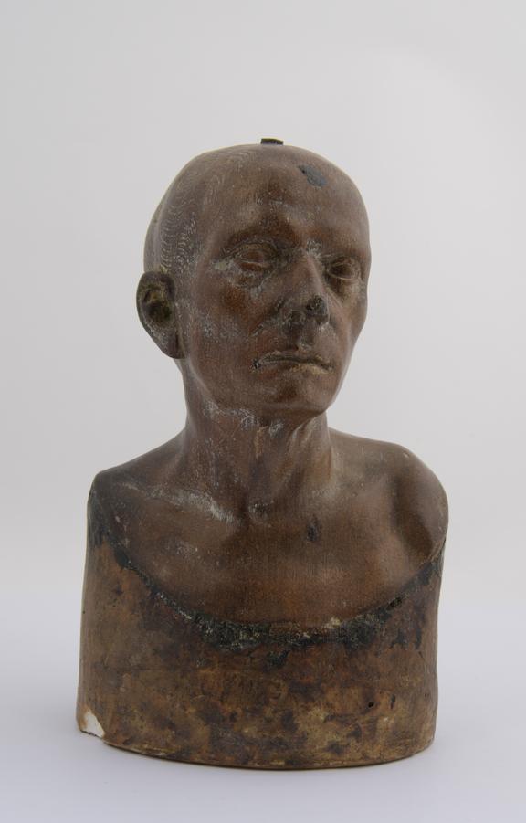 1 Plaster bust, coated with brown compo