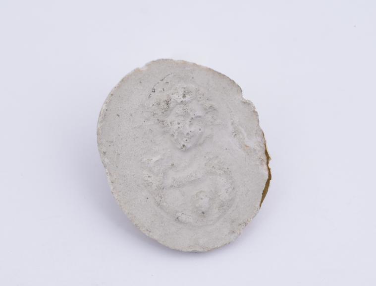 1 Plaster cast, bust of woman in relief, goblet in one hand