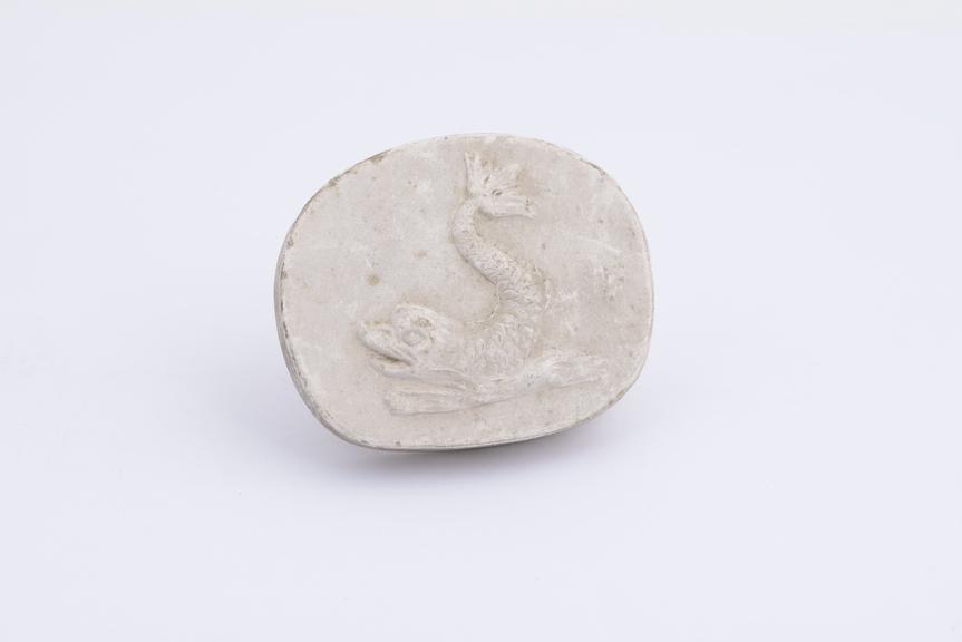 Plaster cast, Dolphin, semicircular 1 7/8 x 1 1/2''