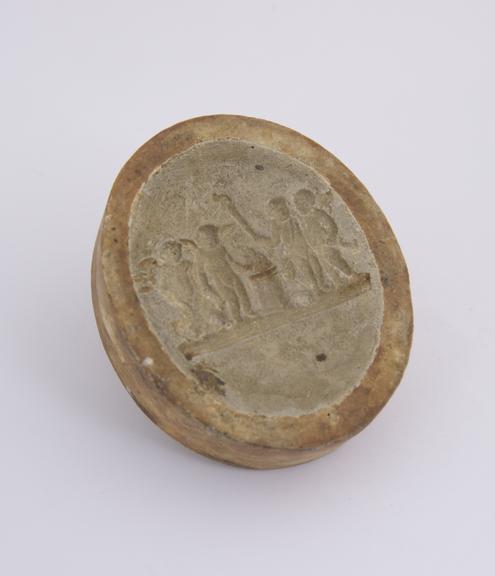 Compo mould, nude figures around altar