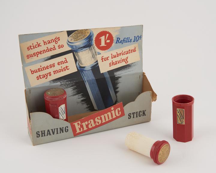 Two 'Erasmic' shaving sticks in sales display box.