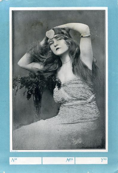 Shipper's ticket of a woman posing with flowers