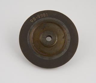 Emery composition lathe operated grinding wheel