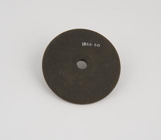 Emery composition lathe operated grinding wheel