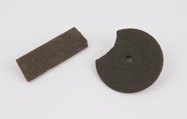 Emery composition lathe operated file and gring wheel