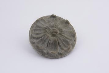 Stone reproduction, rosette on circular base