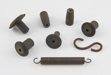 Components of Jones "Handfiller" cigarette making machine