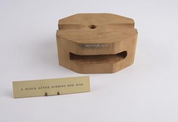 Ship's rigging pulley block, with corners sawn off