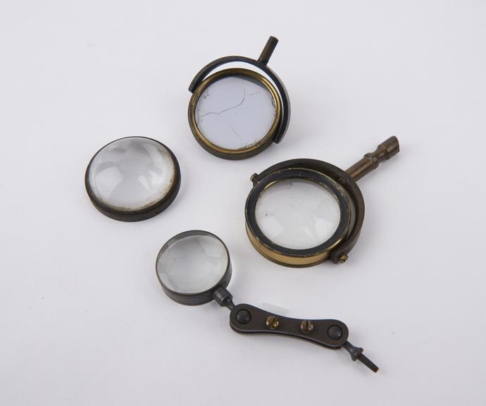 Tin with miscellaneous microscope accessories, 19th century