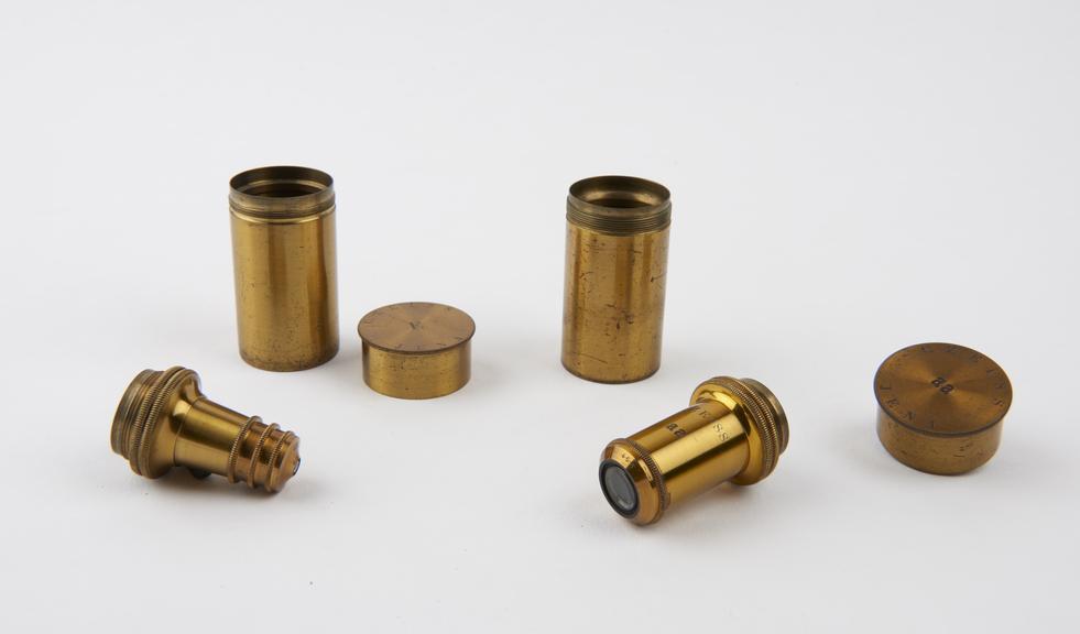 Two microscope objectives in cannisters, by Zeiss, German