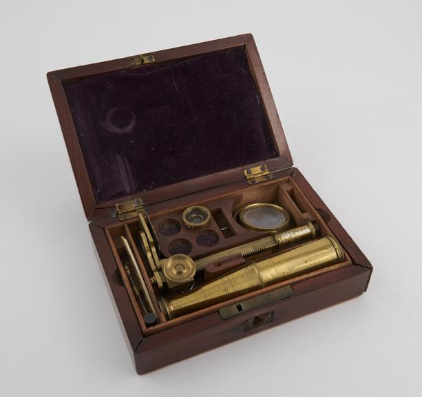 Small box-foot microscope with eyepiece and one objective only