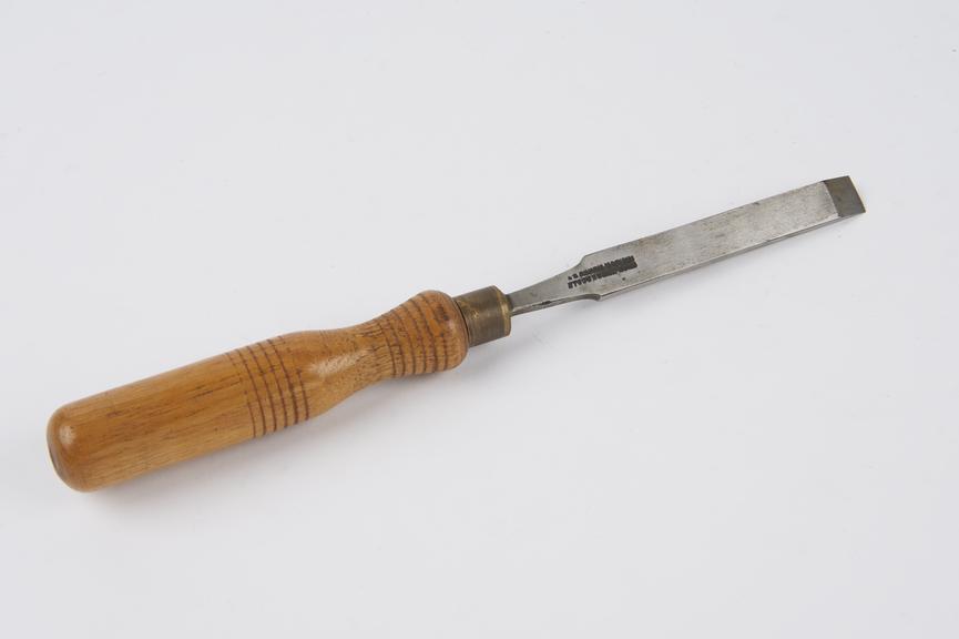 A 1/2 firmer chisel with a common round ash handle