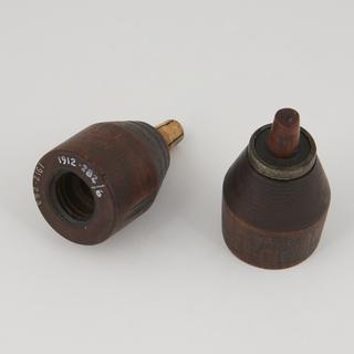 Two wooden ornamental spigot chucks