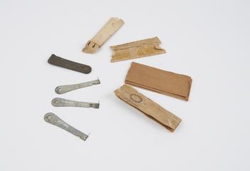 Four blow lamp cleaning pins in a box