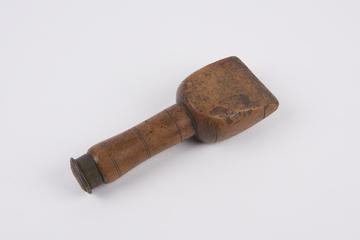 Plumber's chase wedge, used for drawing lead sheet into an angle corner