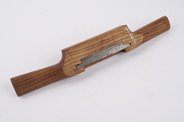 A wooden spokeshave plane