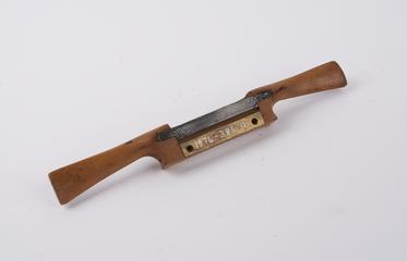 A wooden spokeshave plane of the type used by a coachmaker