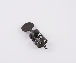 corkscrew, metal with a decrative pattern