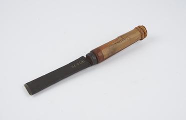 Chisel, wooden handle with torn paper label and number 22 marked on end