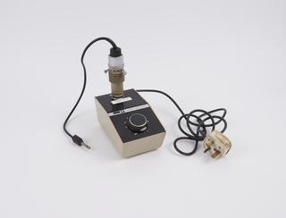 Microscope lamp, with power pack