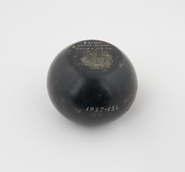 One of Eight Roman weights of black basalt, 1st century A.D