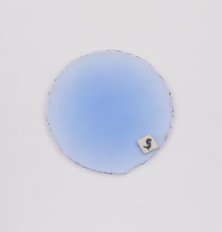 Round blue double convex spectacle lens