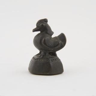 Metal weight in the shape of a cockerel