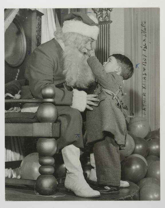 A photograph from the Daily Herald Archive showing a small boy