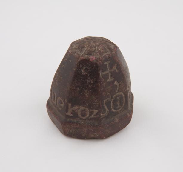 Crellin stone weight with engravings