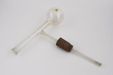 Distillation flask with cork on side arm