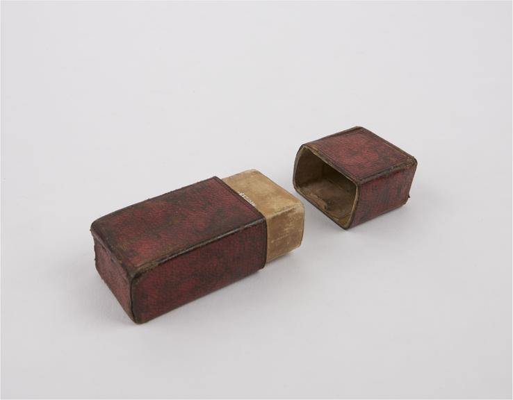 Case for folding hand microscope,, covered with red leather